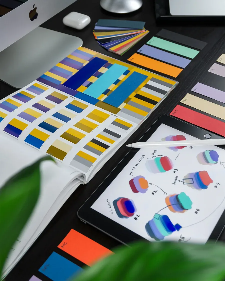 A designer reviewing a molded product component